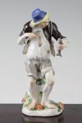 A Meissen figure of a Drunken Fisherman, c.1740, modelled by J.J. Kandler, inebriated leaning