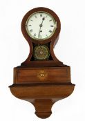 An unusual late 19th century mahogany balloon cased alarm wall clock, with painted dial and integral
