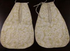 A pair of 1720`s fine linen lady`s pockets, embroidered in yellow silk thread in an all over