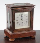 A Victorian rosewood mantel timepiece, with silvered dial signed J.Hallis, Albion Chambers, Bristol,