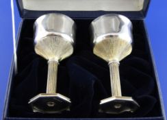 A 1970`s cased pair of limited edition parcel gilt silver goblets to commemorate the 800th