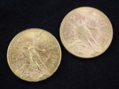 Two Mexican Centenario 50 pesos gold coins.