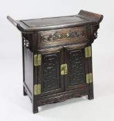 A Chinese rosewood side cabinet, with shaped top, single drawer and two cupboard doors with blind