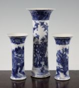 Three Chinese export blue and white trumpet shaped vases, Qianlong period, the tallest painted