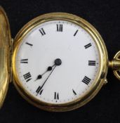 An early 20th century 18ct gold keyless lever half hunter fob watch, with Roman dial, interior