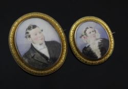 Two 15ct gold mounted watercolour portrait miniatures, of a lady and a gentleman respectively, the