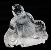 A Chinese rock crystal figure of Shou Lao, seated beside a deer, 11.5cm.