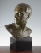 Lucien Gibert (French, 1904-1988). Bust of the aviator Jean Mermoz, the patinated bronze mounted on