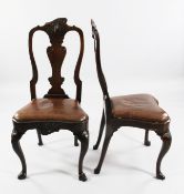 A set of six early 18th century Dutch beech and walnut dining chairs, with brass shaped splats and