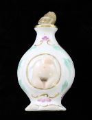 A Meissen erotic subject scent bottle, 19th century, of baluster form, each side depicting a woman