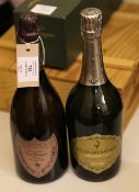 Four bottles of prestige cuvee and vintage champagne including one Dom Perignon Rose 1996; one Dom