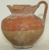 A Greek semi-eggshell pottery jug, 4th century BC, of ovoid form the upper half with red glaze, 3.