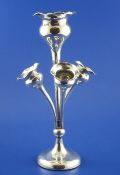 An Edwardian silver epergne, with one large and three smaller removable tulip shaped receivers,