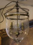 A pair of Victorian engraved glass storm shades ceiling lanterns, with later brass fittings, 12in.