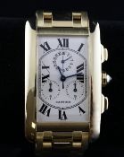 A gentleman`s 18ct gold Cartier Tank Americaine chronograph wrist watch, with Roman dial and