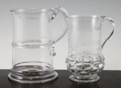A dated George III glass tankard and a mid 18th century glass tankard, the first baluster shaped
