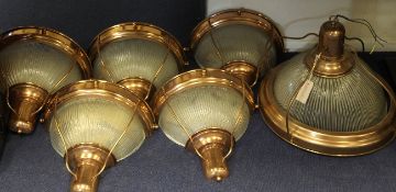 A circular copper framed ceiling light, with ribbed frosted glass shades, together with five