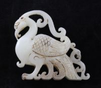 A Chinese white bowenite carving of a phoenix, with flowing scrollwork decoration, 8.2cm.