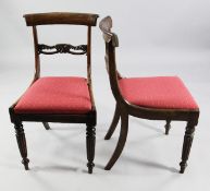 A set of six Regency rosewood dining chairs, with scroll carved spar backs, red patterned seats and
