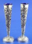 A pair of late 19th/early 20th century Chinese silver posy vases by Wang Hing, Hong Kong, of