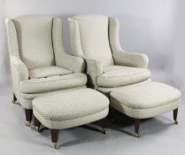 A pair of 20th century wingback armchairs, together with a pair of matching foot stools, with