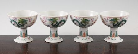 A set of four Chinese famille rose `dragon` stem cups, early 20th century, each painted with