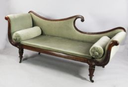 An early 19th century Chinese scroll chaise longue, with palmette and shell carved frame, on