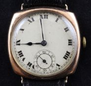 A gentleman`s early 1930`s 9ct gold manual wind wrist watch, with shaped circular case and Roman