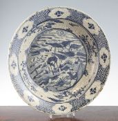 A Chinese Ming blue and white dish, Swatow, early 17th century, painted to the centre with a deer