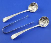 A pair of George III silver feather edge Old English pattern sauce ladles by Hester Bateman, with