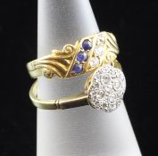 A 1920`s 18ct gold and platinum, diamond cluster ring, together with an earlier 18ct gold sapphire