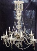 A Victorian style cut glass and lustre hung ten branch chandelier, with multi-knop stem with