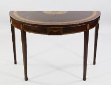 A George III and later marquetry inlaid and crossbanded demi lune hall table, the top with central