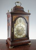 Thomas Grinnard, High Holborn. A George III walnut cased bracket clock, with arched brass dial,