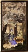 An 18th century Chinese Export reverse painted mirror, depicting a shepherdess in traditional blue