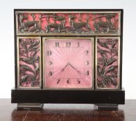 A French Art Deco black slate mantel clock, with central rectangular pink enamelled dial between