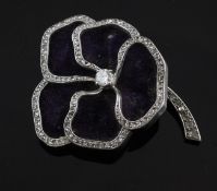 A Cartier two colour gold and diamond `pansy` brooch, with diamond edged velvet petals and central