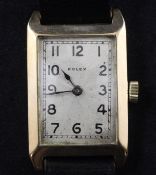 A gentleman`s late 1920`s 9ct gold Rolex manual wind wrist watch, with rectangular Arabic sunburst