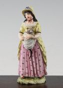 A Naples porcelain group, 19th century, modelled as a lady wearing a yellow and pink dress and