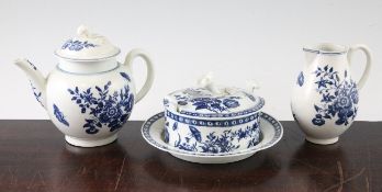 A group of Worcester pieces in the Three Flowers pattern, c.1775, comprising a globular teapot and