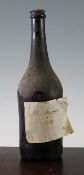 One bottle believed of Cognac Fine Champagne, hand written label dated 1752, contemporary hand