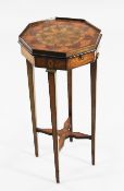 A Sheraton style mahogany and marquetry inlaid urn stand, the octagonal shaped top with central