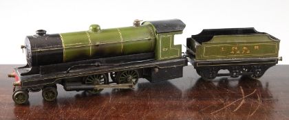 A Bowman O gauge live steam 440 locomotive and tender, in green and black LNER livery, with