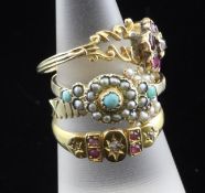 Four late 19th/early 20th century gold and gem set rings, including seed pearl and garnet and ruby