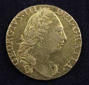 A George III 1779 gold guinea, (Good VF)