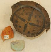 Three Greek, Egyptian and Roman pottery fragments, the largest an Etruscan Genucilia plate c.300