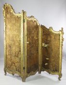 A Louis XIV style carved giltwood three fold screen, with floral brocade panels, H.6ft 2.5in.