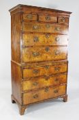 An 18th century walnut chest on chest, fitted with three short drawers over three long graduated