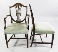 A set of ten late 19th century Hepplewhite style mahogany dining chairs, two with arms and eight