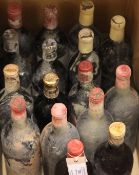 A sixteen bottle assortment of post-war classed growth clarets and equivalents including one